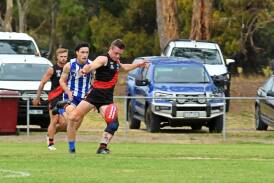 Noradjuha Quantong's Brock Orval with space to play with kicks upfield against Harrow Balmoral at Quantong Recreation Reserve in round one of the HDFNL on Saturday, April 13. Picture by John Hall