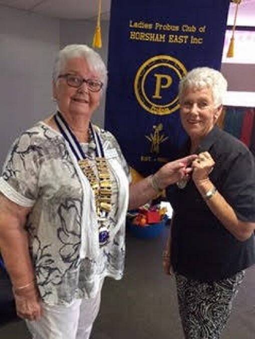 RECOGNITION: Margaret presents Nita Ingleton with her 20-year pin at the Probus East Ladies March meeting. 