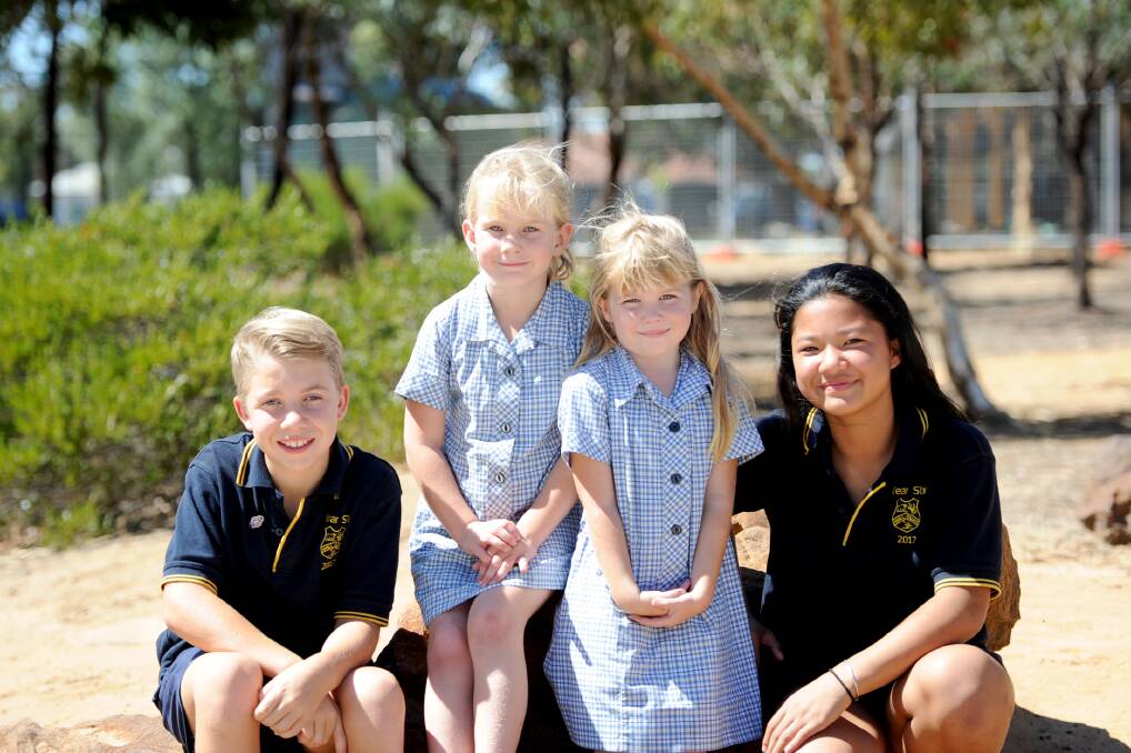 BUDDIES: Nhill College grade six students Thomas Dart and Ella Pay, with prep students Jessika Cannell and Brightie Etherton. Picture: SAMANTHA CAMARRI