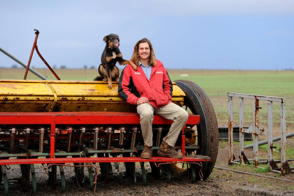 AT HOME: Horsham's Dustin Cross on the farm with his sidekick Winnie. Dustin has started his own mobile shearing business. Picture: SAMANTHA CAMARRI