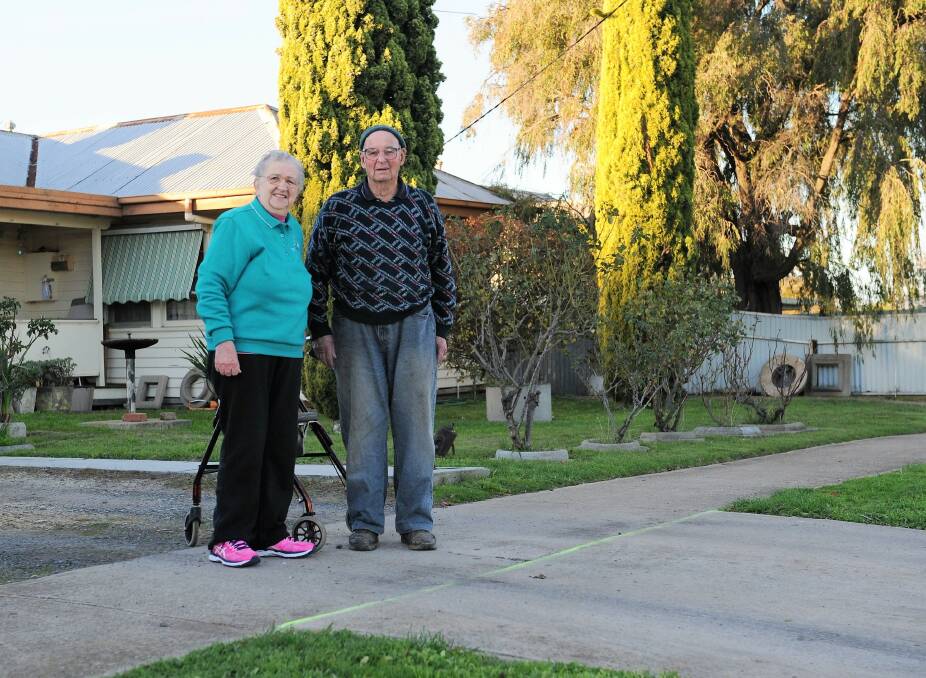 DANGEROUS: Horsham's Caroline and Kevin Lane outside their Edith Street house. They are calling for council to fix issues with driveways in the street. Picture: ERIN WITMITZ