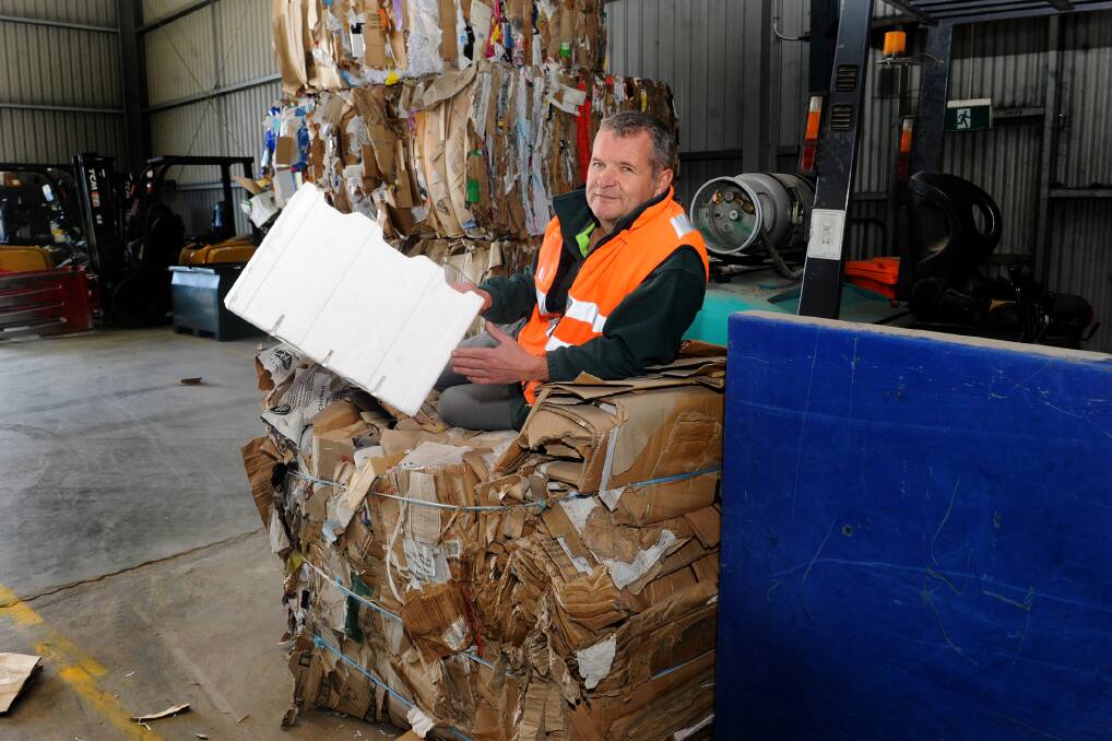 ENVIRONMENT: Wimmera Wastebusters owner-director Mick Morris has encouraged people to recycle. Picture: SAMANTHA CAMARRI