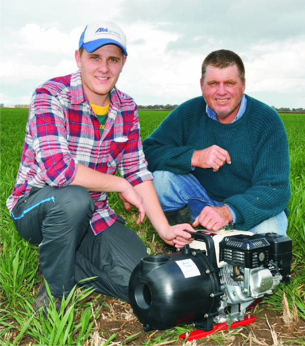 PUMPS: Ron and Chris Andrighetto from Griffith with the three inch Aussie poly pump, a low cost, solution for pumping liquid fertiliser. Picture: CONTRIBUTED
