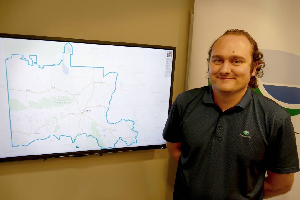 MAP: Wimmera CMA’s Paul Skeen demonstrates how the new Wimmera map can give people various perspectives of the region. Picture: CONTRIBUTED