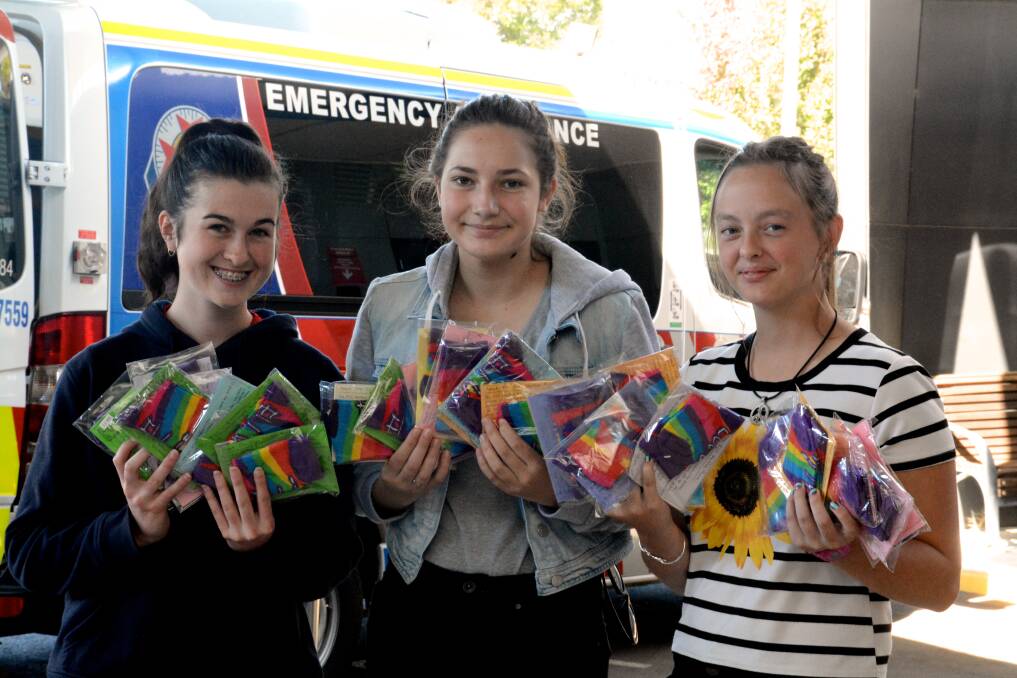 Warracknabeal Secondary College students Leah Penny, Darcie O’Connor and Ireland Power raised more than $1000 for the Elli Martha fund. Picture: CONTRIBUTED