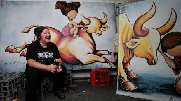 Street artist Kaff-eine with some of the work for her upcoming exhibition in 2015. Picture: THE AGE