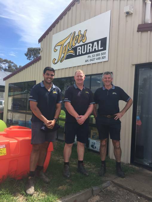 BUSINESS MILESTONE: Tyler's Rural agronomist Ash DeClifford, manager Karl Hendy and owner Kelvin Tyler. Picture: ANTHONY PIOVESAN