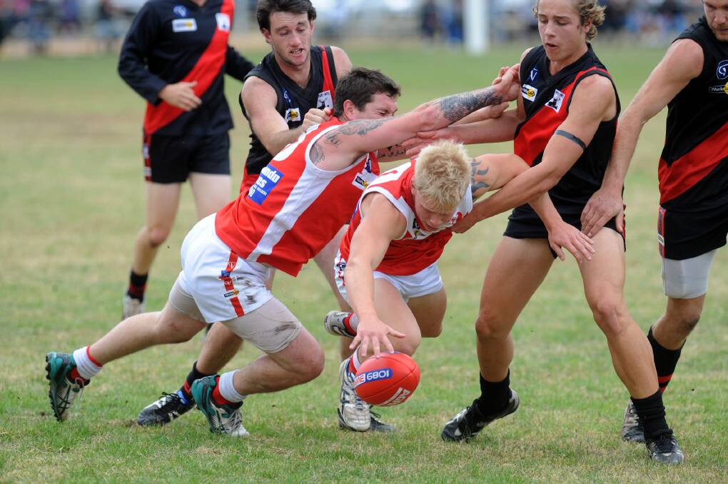 Taylors Lake's Jack McRae bursts through the pack against Noradjuha-Quantong, when the two sides met earlier in 2014. Picture: PAUL CARRACHER