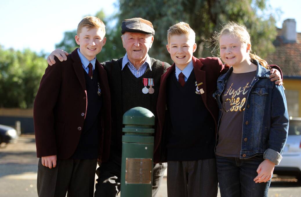 John Crabtree with his grandchildren Connor, Blair and Allie Burns. Picture: PAUL CARRACHER