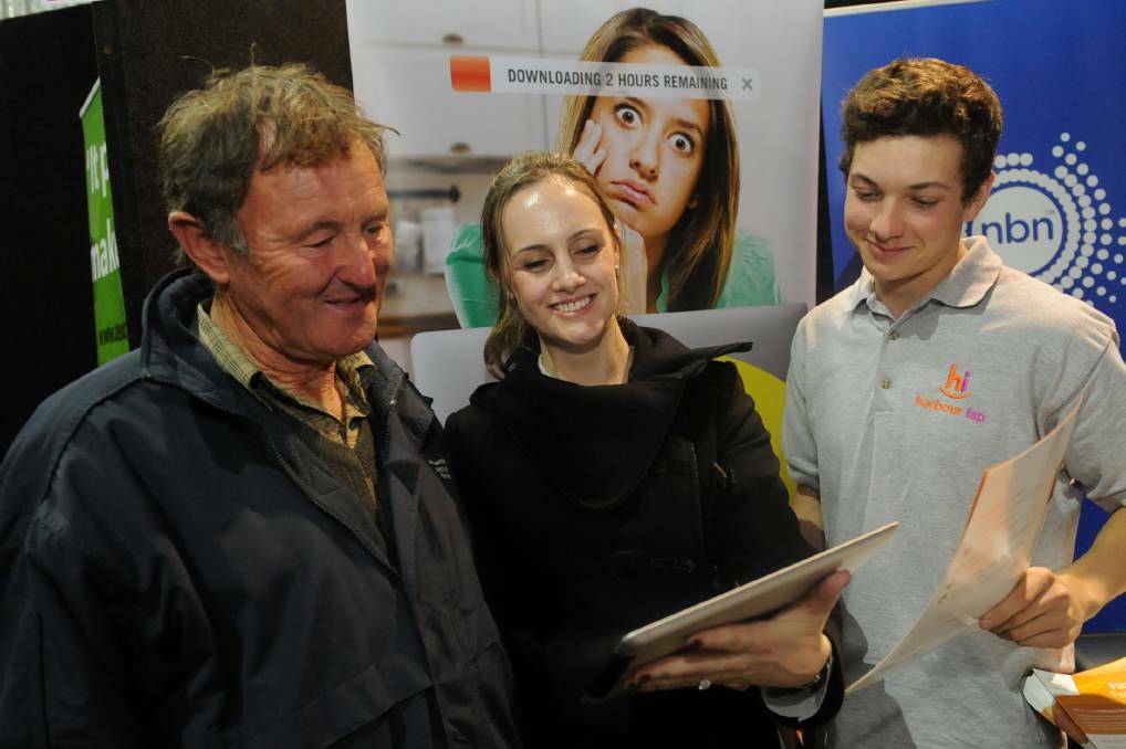 EXPO: Warracknabeal's Lance Huebner with Harbour ISP's Jane Kinsey and Lachlan Bishop at the BCG Future Farmers Expo in 2015. Picture: SAMANTHA CAMARRI