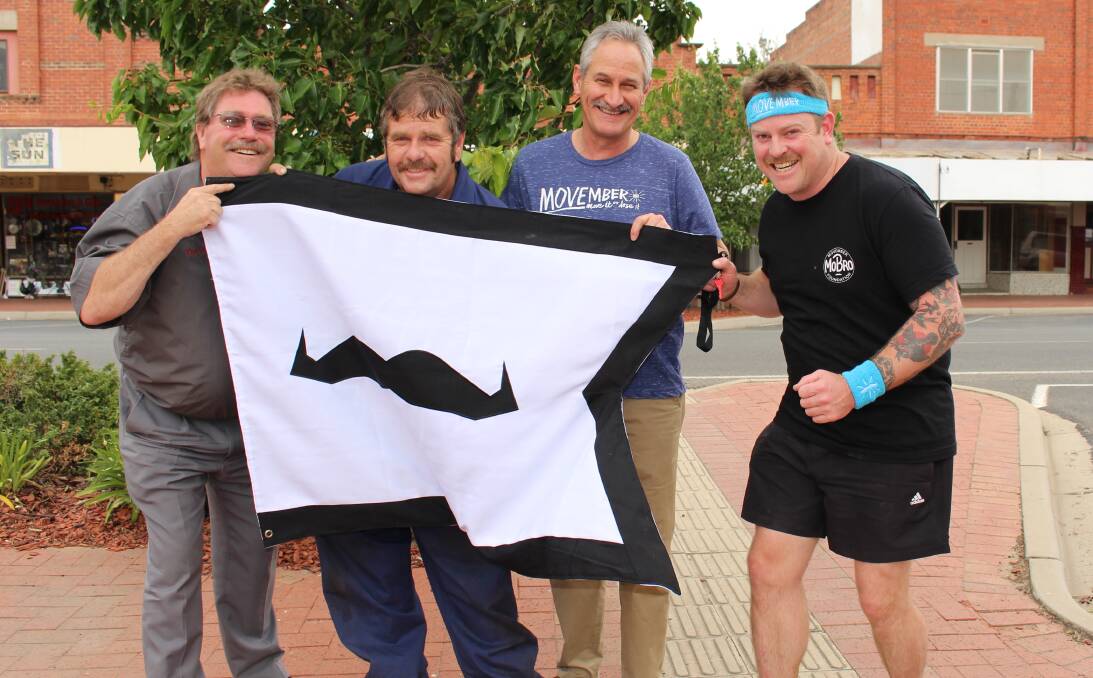 BRISTLES: Team Movember Dimboola are doing their part for the men's health initiative. David Ward, Joe Smithyman, John Hutchins and Col Campbell get excited for the Dimboola fun run on Sunday. Picture: CONTRIBUTED