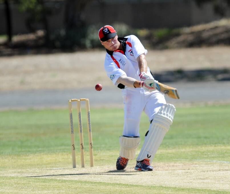Justtin Combe swings and missed during his 40 run innings against Laharum on Sunday. Picture: PAUL CARRACHER