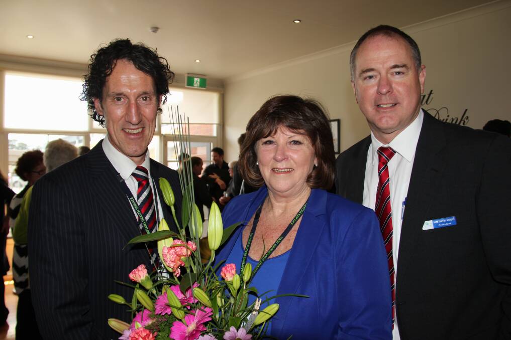 FOND FAREWELL: East Grampians Health Service chief executive Nick Bush, left and board president Matthew Wood farewell manager executive services Glenys Andrew.