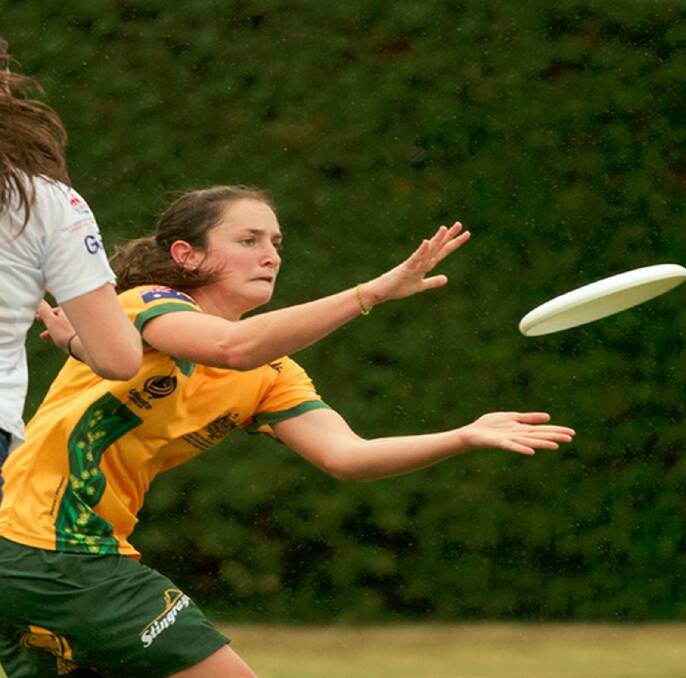 GRAB: Australian Lauren Tink grabs the disc during an under-23 game against Great Britain. Picture: CONTRIBUTED