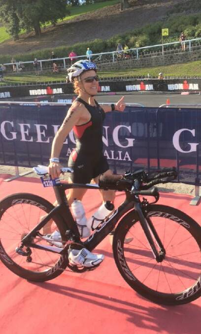 ON THE BIKE: Susie Ellis with her bike during the cycling leg of the Geelong half ironman event at the weekend. Picture: CONTRIBUTED