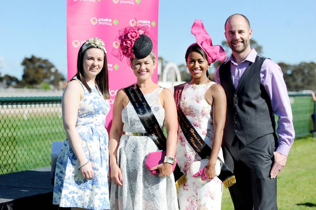 Cobie McQueen and Matthew Meek, Priceline Horsham, with fashions on the field runner-up Belinda Nurse, second from left, and winner Mary Baxter. Picture: SAMANTHA CAMARRI