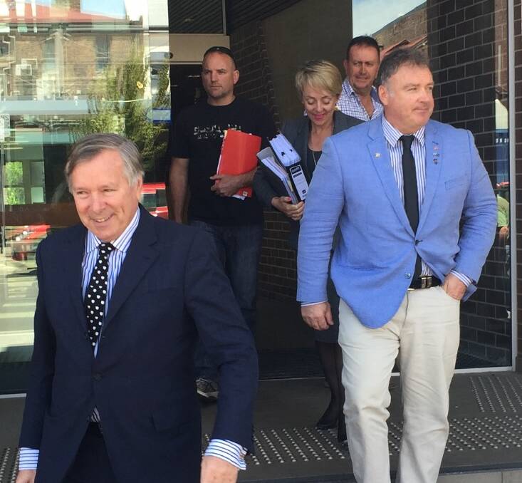 No conviction: Barrister Peter King, left, and Senator Rod Culleton, right, leave Armidale Local Court. Photo: Breanna Chillingworth