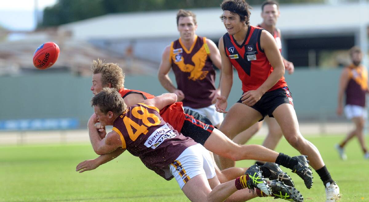 PLENTY AT STAKE: Warrack Eagle Brad Krahe tackles Stawell's Tom Eckel during the two sides' clash earlier this year. Picture: PAUL CARRACHER