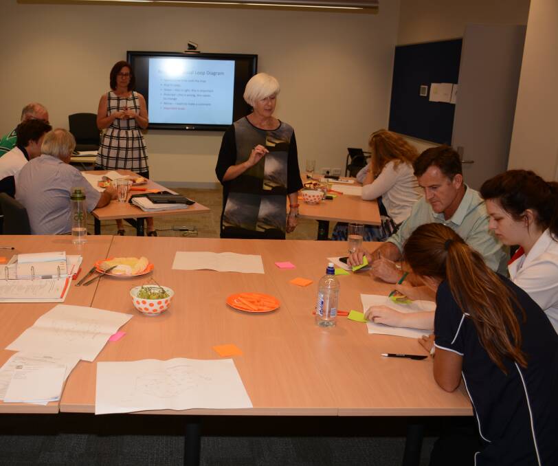 YCHANGE: Project manager Jill Whelan leads a group through a recent planning meeting. Picture: CONTRIBUTED