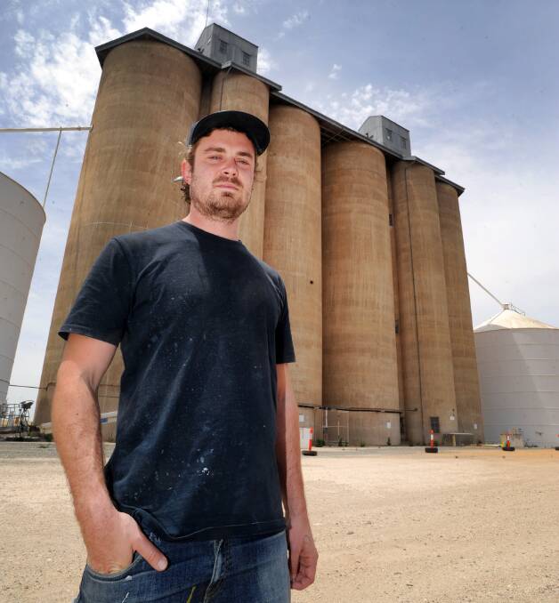RENOWNED: Street artist Guido van Helten will begin painting a 30m x 30m scene on GrainCorp’s decommissioned grain silos at Brim. Picture: PAUL CARRACHER
