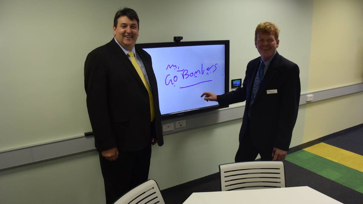 FedUni head of Wimmera campus Geoff Lord with Horsham Rural City councillor Mark Radford in the new eLearning hub.