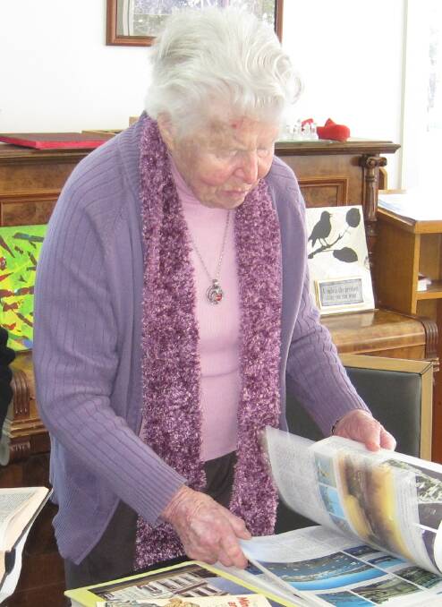 ALL INTERESTS: Jessie Guest looks through books ahead of the book fair.