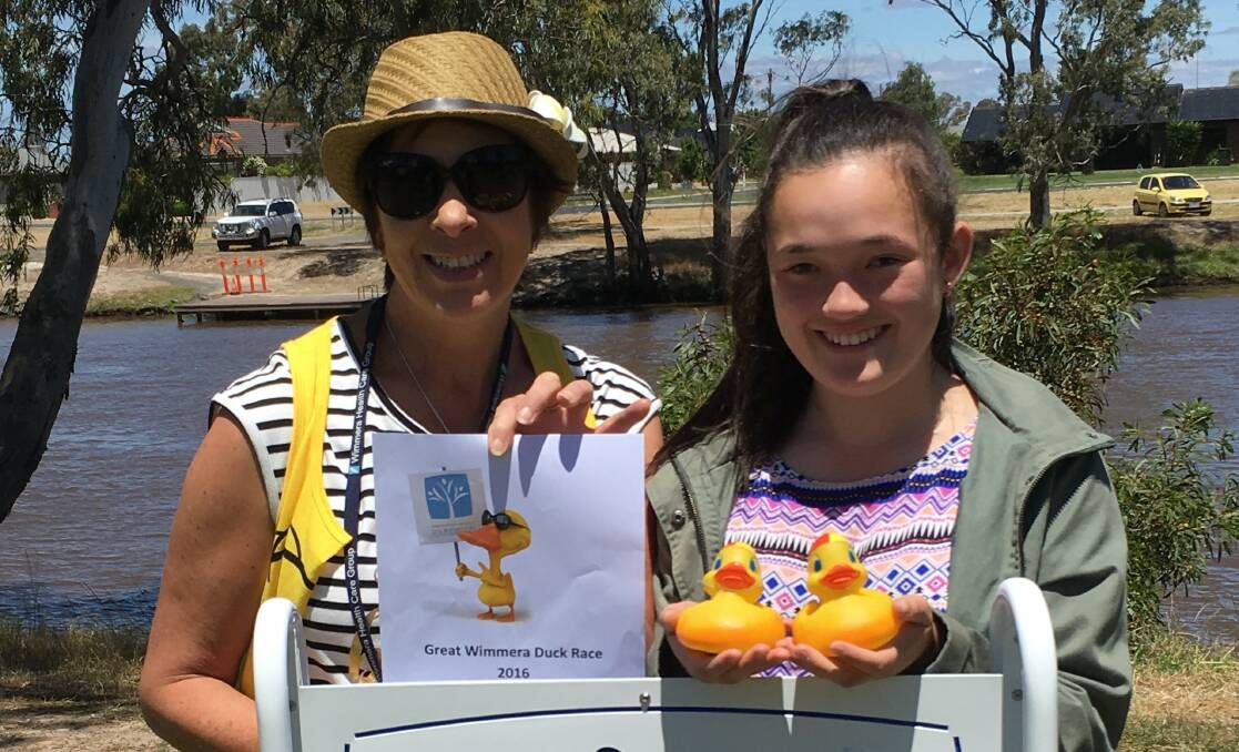 GENEROUS: Great Wimmera Duck Race co-ordinator Diana McDonald with winner Kira-Ly Duplock of Laharum. Picture: CONTRIBUTED