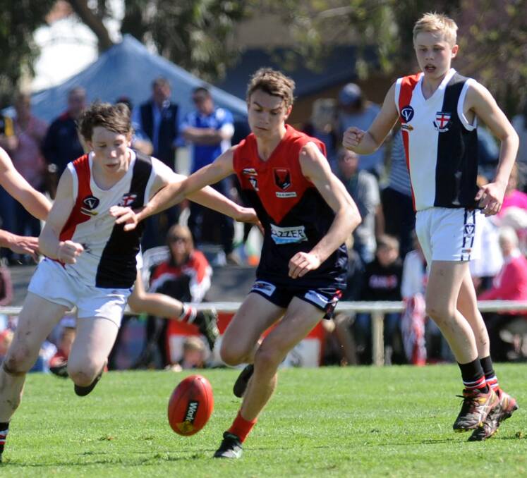 ON THE RISE: Laharum's Joe Harrison, middle, showed his potential with a nine-goal haul against Pimpinio at the weekend. Picture: PAUL CARRACHER