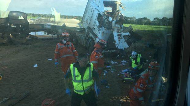The the truck driver is conscious and breathing, a Colac police officer said.
