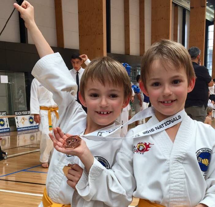 Twinning: Twin brothers Jack Sirre and Justin Sirre show off their medals after a successful campaign at the National Taekwondo Championships in November. Picture: Supplied