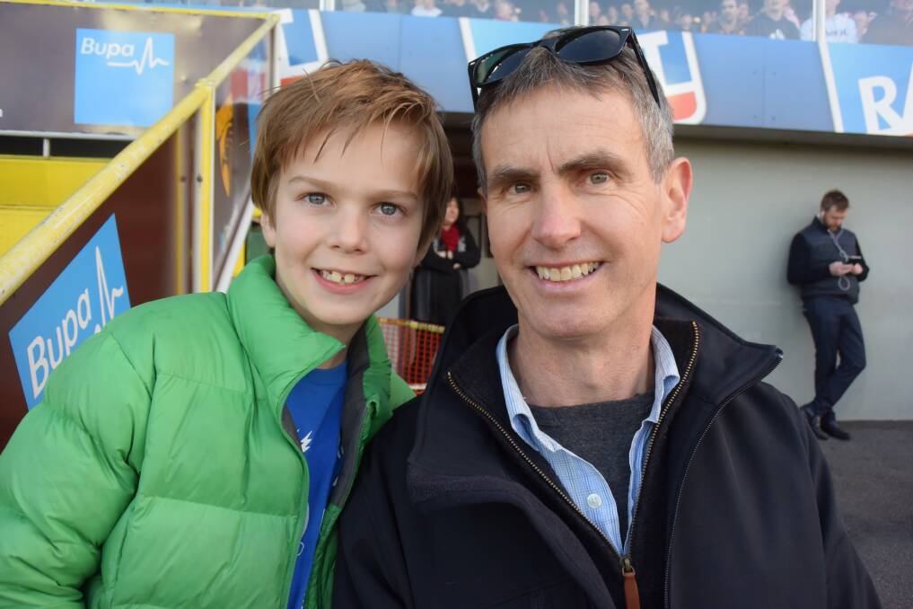 Tom, 8, and Rod Davis, both from Evandale, watched the Hawks v Giants match. Picture: Tess Brunton