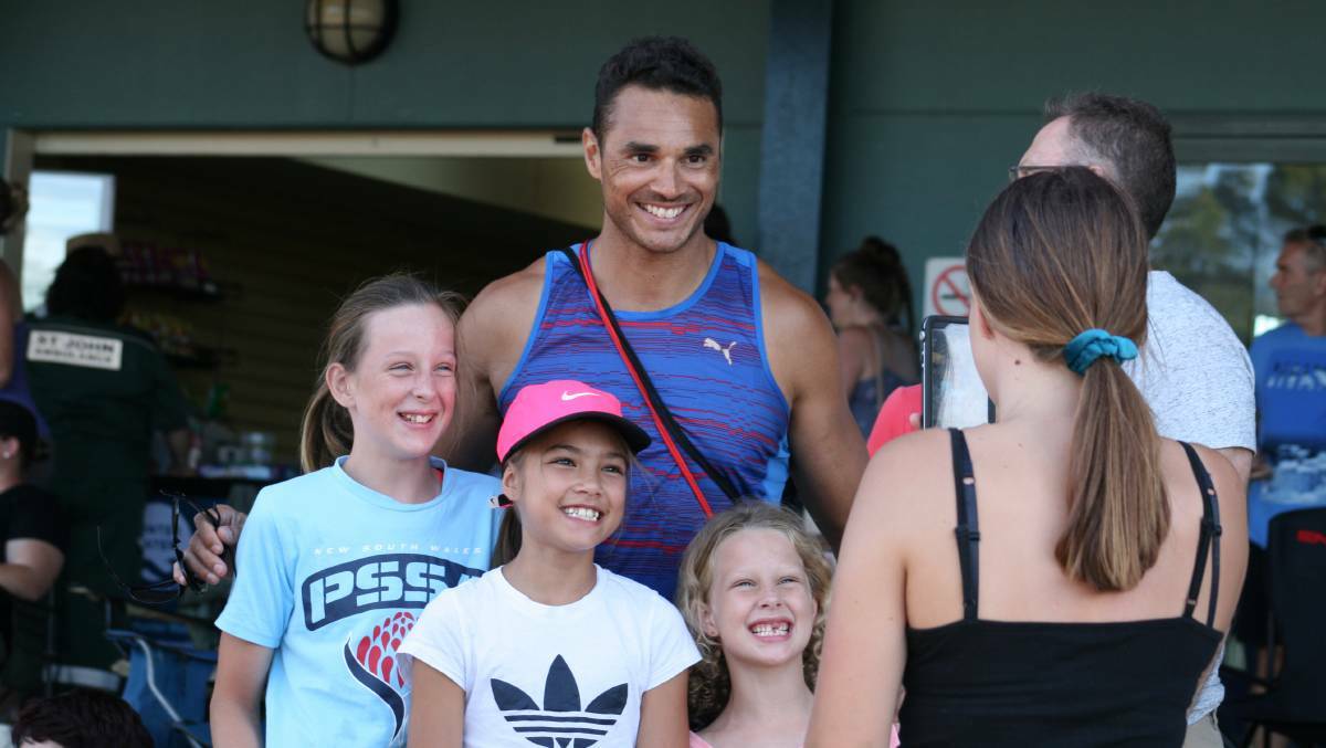 COMEBACK: Two-time Olympian Josh Ross poses for a photo with young fans at last month's Hunter Track Classic. Picture: Josh Callinan.