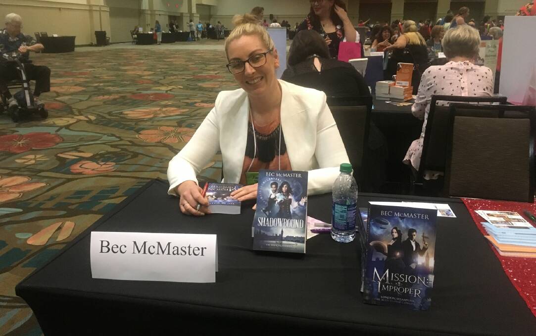 BUSY: Bec McMaster was also part of a public book signing at the conference in Florida. Ms McMaster returned to Australia with three awards from the event.
