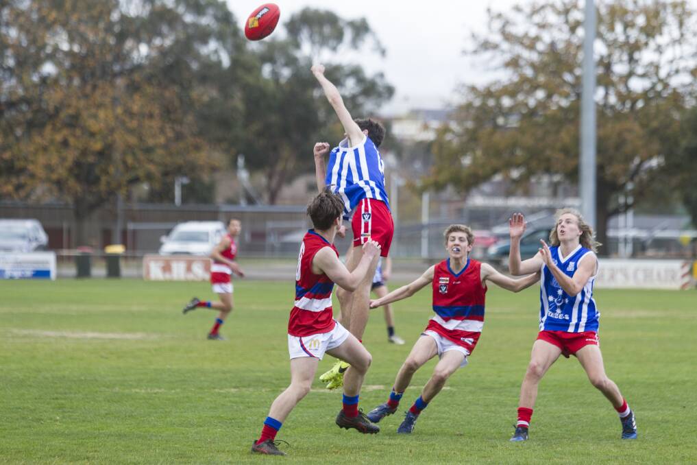 SELECTED: Ararat's Luke Spalding gets some air during a contest in a trial game at Alexandra Oval in July. Picture: Peter Pickering