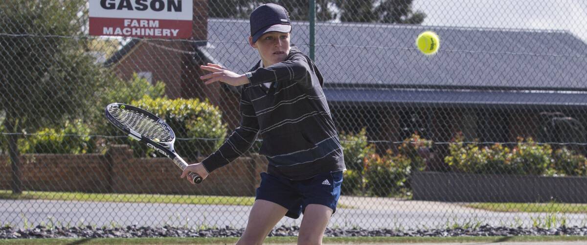 FOCUS: A nicely poised James Phillips sets himself for a forehand return at the Ararat Tennis Courts. Picture: Peter Pickering