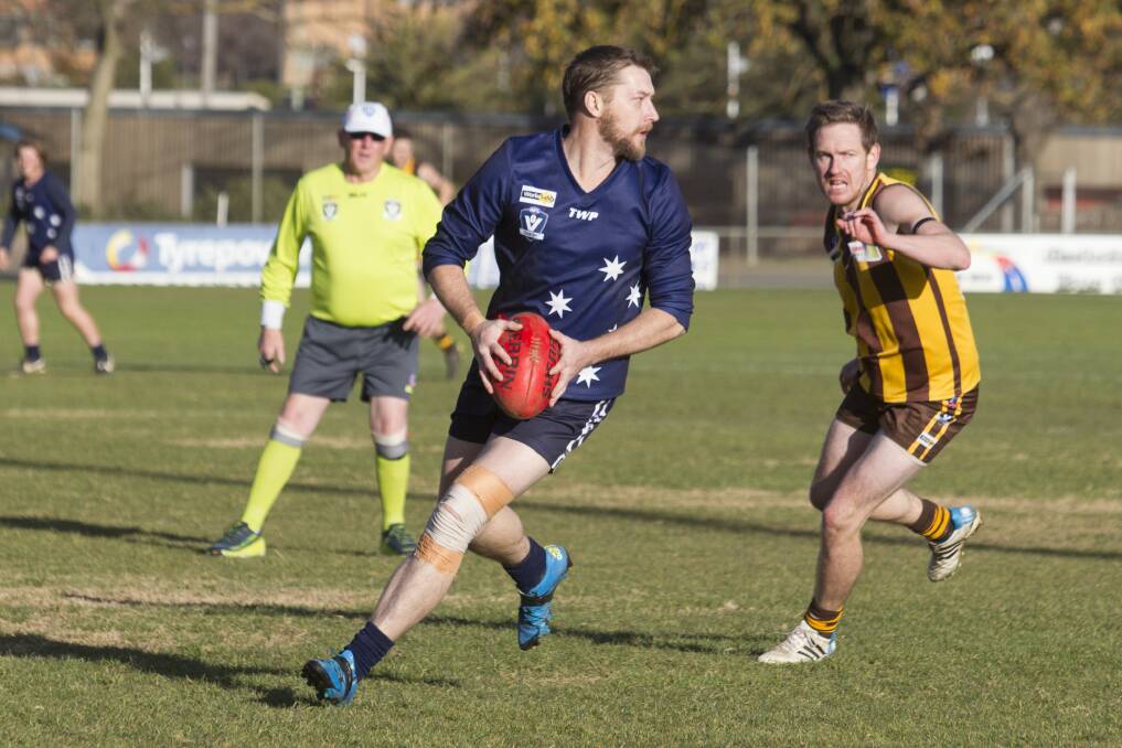 Ararat Eagles' Andrew Beckwith looks for an option against Tatyoon in round 12. Picture: Peter Pickering