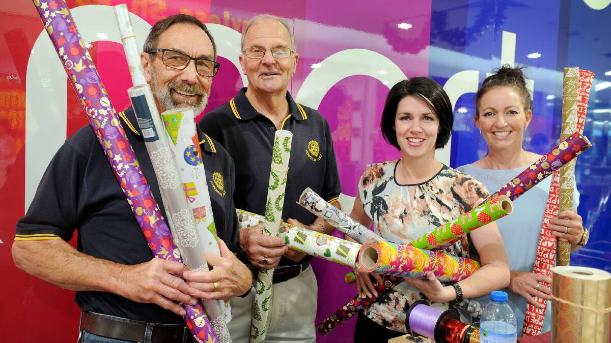 WRAPPED: Rotary Club of Horsham East's Don Mitchell,
Chas McDonald and Sallie Koenig with Member for
Lowan Emma Kealy last year. Picture: AYESHA SEDGMAN