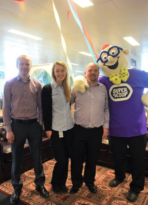 SALE: Harvey Norman workers, Rory Seidel, Kristy O'Connell and Tristan Wessling with Super Scoop. Picture: DAINA OLIVER.