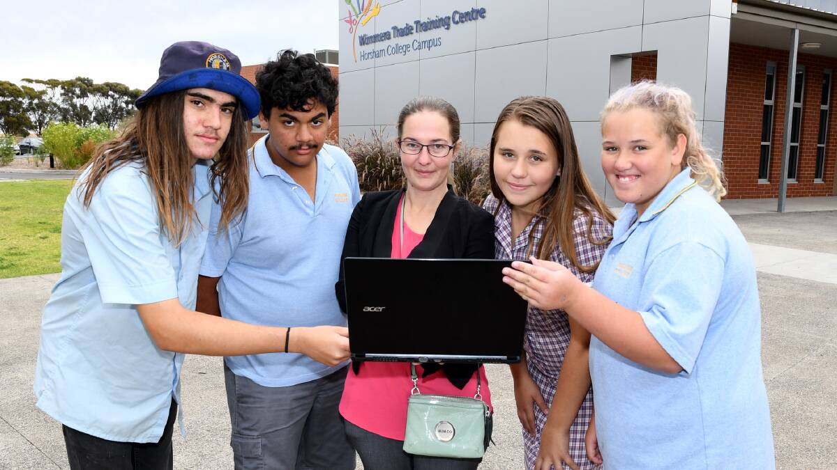 INCLUSIVE: Horsham College students Dominic Albanese, Austin King, Holly Britten and Charlotte Barrett with student engagement and wellbeing assistant principal Meg Woolford. Picture: SAMANTHA CAMARRI