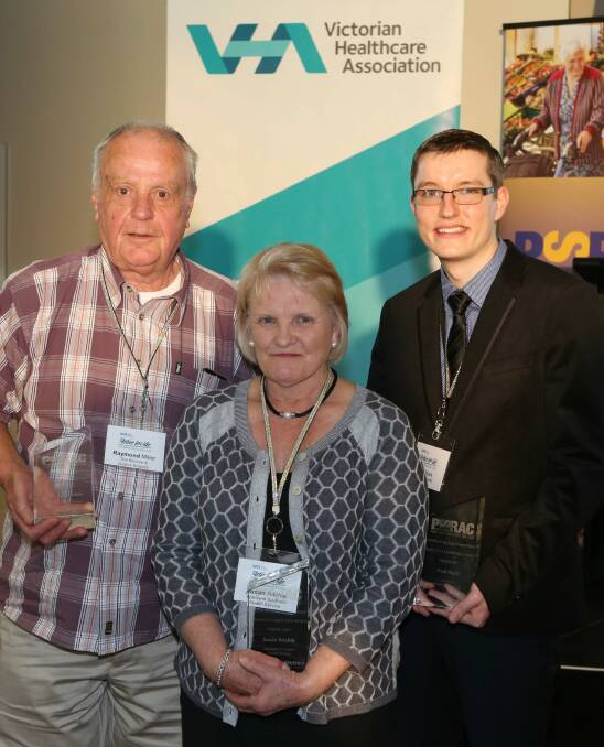 RECOGNITION: Wimmera Health Care Group's Paul Mark with category winners Raymond Miller and Susan Ritchie. Picture: CONTRIBUTED