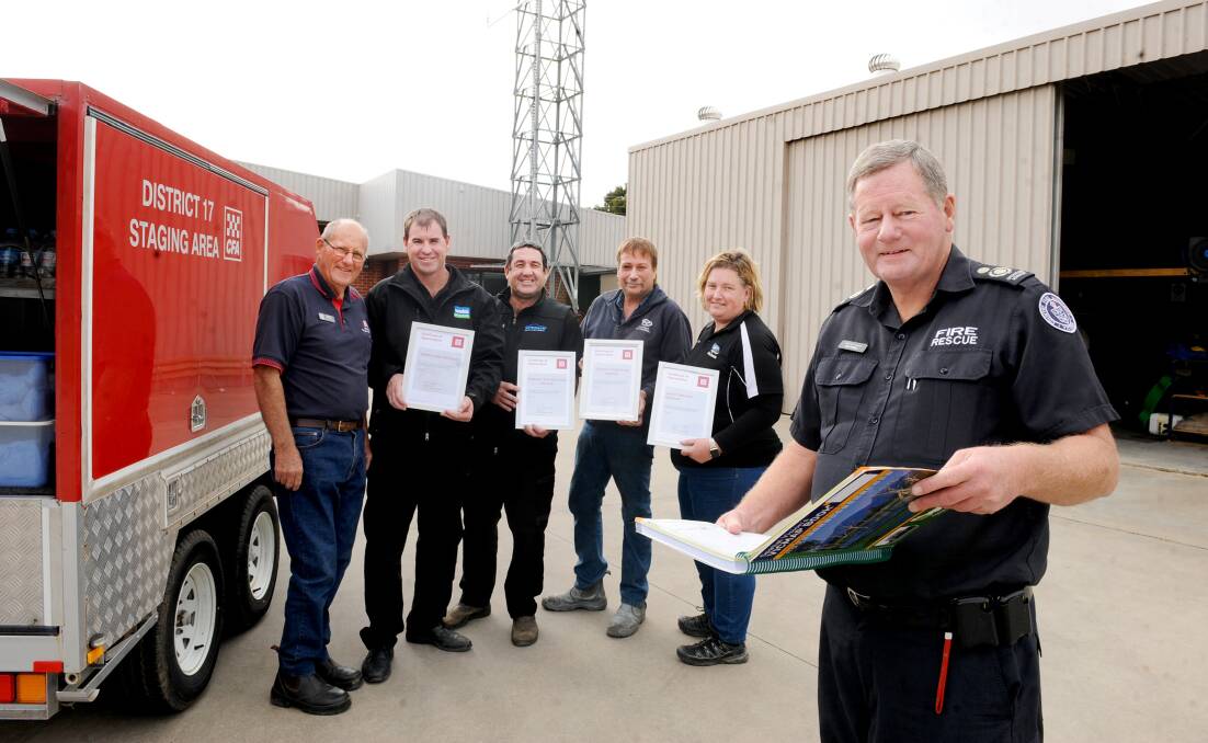 SAFETY FIRST: Barry Paynter, fourth lieutenant, with Adrian Wade, Anthony Schache, Warren Rosevear, Donna Krelle and Dale Russell at the certificate presentation. Picture: SAMANTHA CAMARRI.