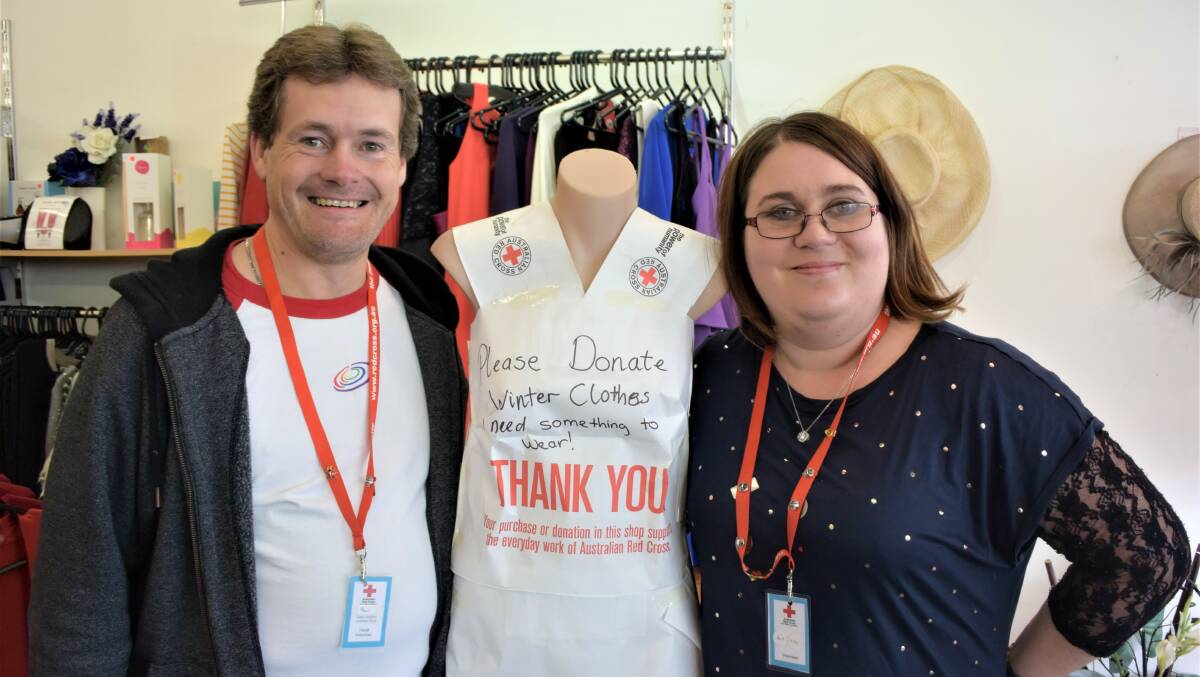 DONATE: Horsham's Red Cross volunteers Paul Henstridge and Lisa Rodgers ask for the community to donate their spare winter clothing to help keep others warm this winter. Picture: DAINA OLIVER