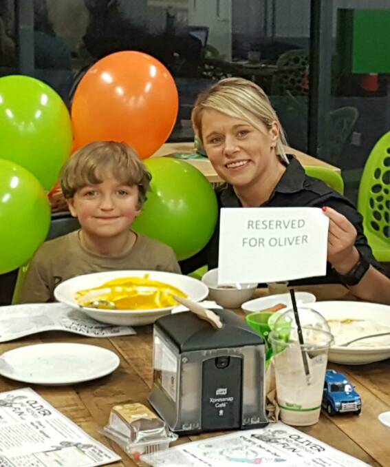 CELEBRATION: Horsham's Oliver Oman with Oliver's Real Food's Kylie Smith at a dinner on Thursday night to celebrate his 7th birthday. Picture: CONTRIBUTED