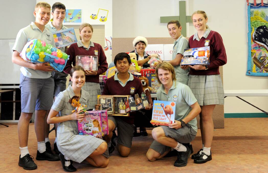 GIVING: St Brigid's College future leaders donate presents from the Giving Tree, which they organised at the school. Picture: OLIVIA PAGE