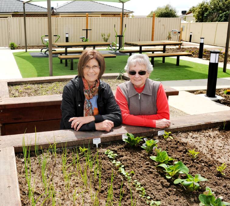 PLANTS: Lois Mulquiny and Theresa Johnson with the new garden that was launched for residents to do gardening. Picture: SAMANTHA CAMARRI
