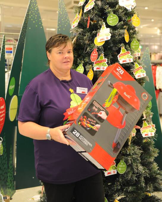 FESTIVE CHEER: Kmart store manager Suzanne Puls is pleased to welcome the 30th year of the Kmart Wishing Tree appeal. Picture: ELIJAH MACCHIA