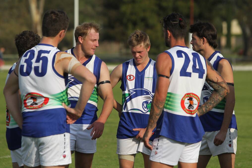 Kaniva-Leeor players talking at quarter time. Picture: NARACOORTE HERALD