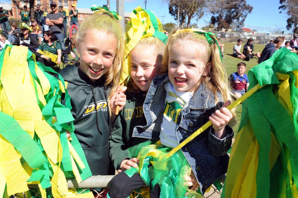 Sisters Stephanie, Paige and Emma Glover support Dimboola at the 2014 finals. Picture: PAUL CARRACHER