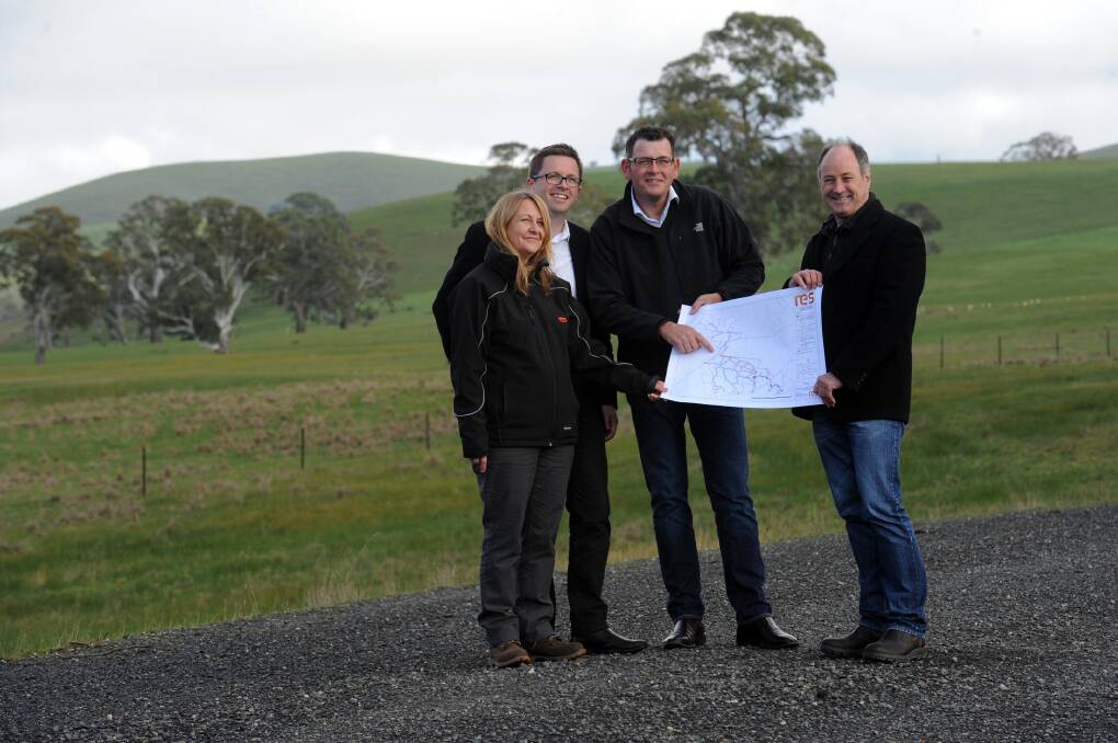 Ararat Mayor Paul Hooper, right, with Premier Daniel Andrews, RES Australia's Annette Devson, and Parliamentary Secretary for the Environment Anthony Carbines near Ararat earlier this year. Picture: PAUL CARRACHER
