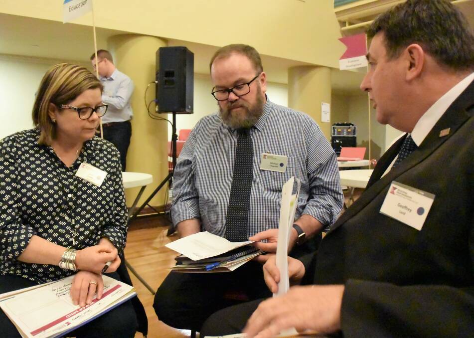 IDEAS: Jane Osborn, Michael Fitzgerald and Geoff Lord discuss education at the Wimmera Southern Mallee Regional Assembly in Horsham on Wednesday. Picture: CARLY WERNER